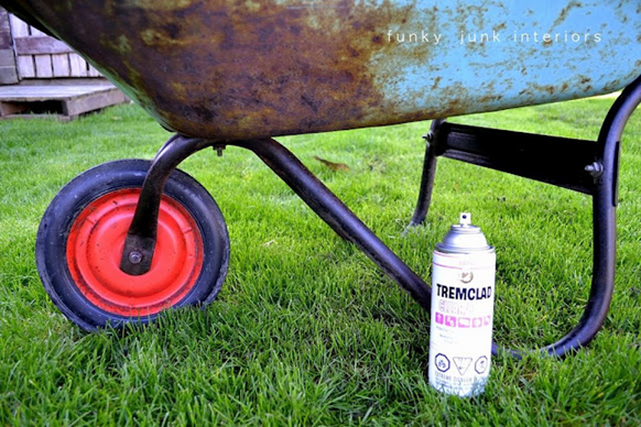 rusty wheelbarrow rusty wheelbarrow
