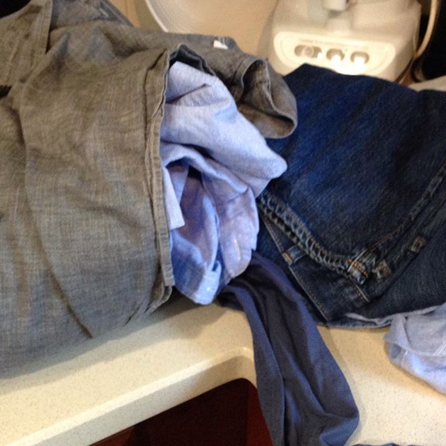 Some may look at this pile and think "why is my darn kid growing so fast?" I think hmm...what can I make out of that fabric?" :)