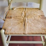 chair with damaged seat and legs
