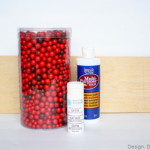 Design, Dining + Diapers sign before