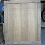 House on Harrison cabinet door before