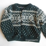 Organized 31 sweater mittens before