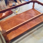 Thrifty Treasures tufted ottoman before