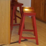 red-saddle-stool